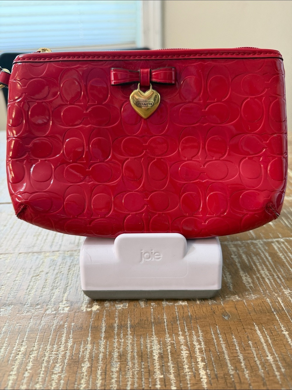 Coach Red Patent Leather Wristlet with Gold Heart Charm